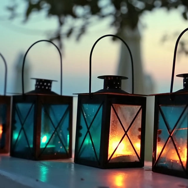 colorful candle lanterns lit at night